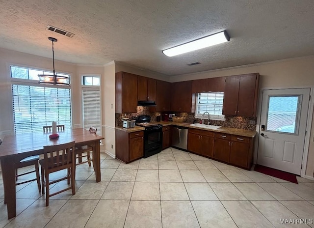 kitchen with visible vents, under cabinet range hood, decorative backsplash, and black range with gas stovetop