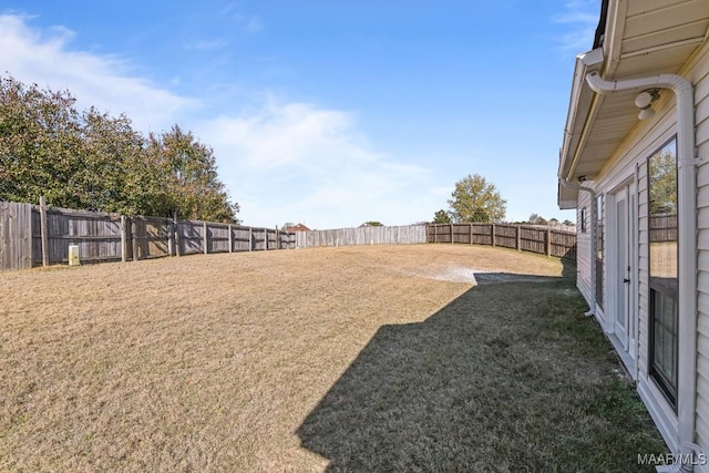 view of yard featuring a fenced backyard