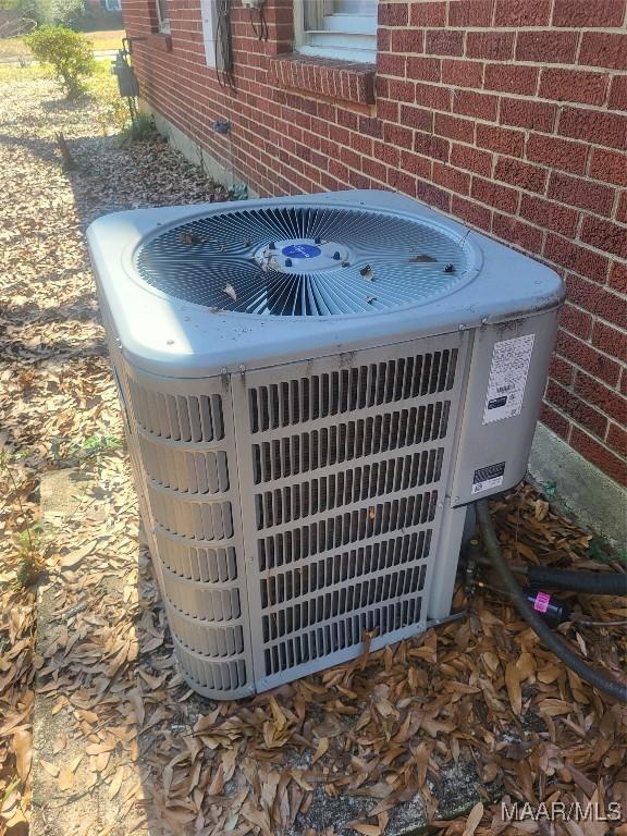 details with brick siding and central air condition unit