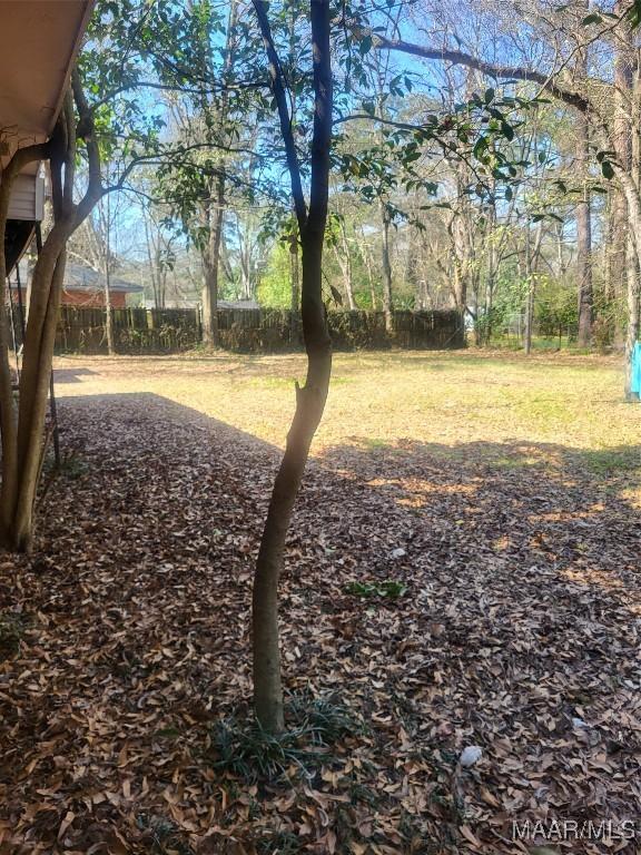 view of yard featuring fence