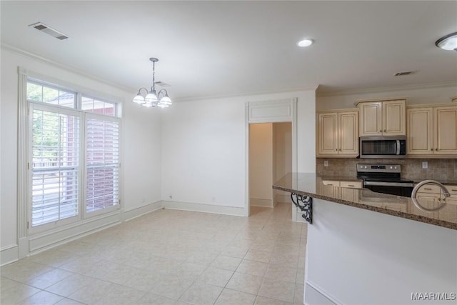 kitchen with visible vents, dark stone counters, decorative backsplash, appliances with stainless steel finishes, and ornamental molding