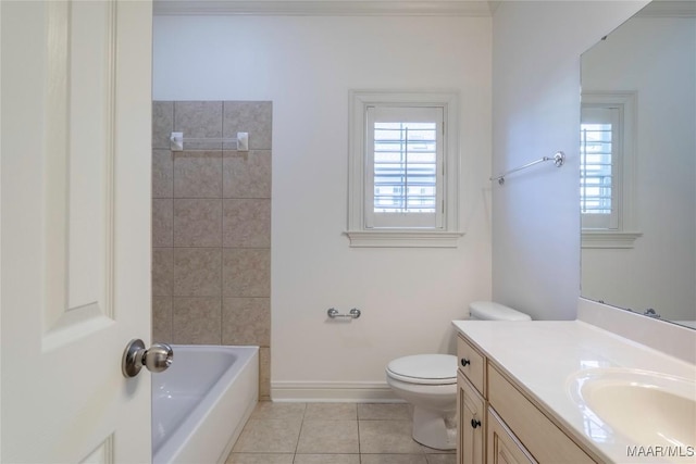 full bathroom featuring toilet, vanity, a wealth of natural light, and tile patterned floors