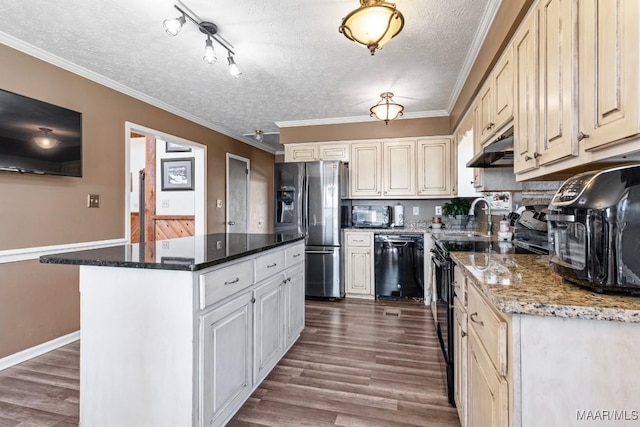 kitchen featuring black appliances, dark wood-type flooring, and crown molding