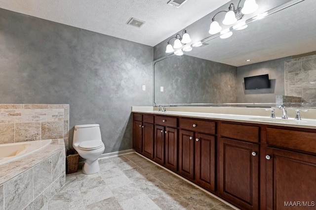 full bath featuring toilet, double vanity, a sink, and visible vents