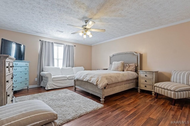 bedroom featuring a textured ceiling, wood finished floors, visible vents, and crown molding