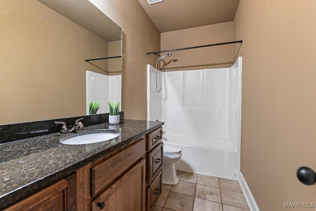 full bathroom featuring bathtub / shower combination, toilet, vanity, tile patterned flooring, and baseboards