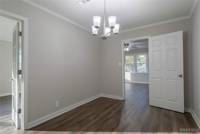 empty room with ornamental molding, dark wood finished floors, and baseboards