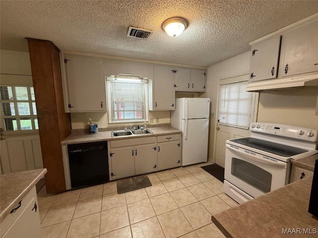 20 Glendale Dr, Selma, AL 36701 - kitchen with visible vents, a sink, white appliances, a textured ceiling, and under cabinet range hood