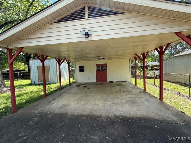 20 Glendale Dr, Selma, AL 36701 - view of car parking with a carport and fence