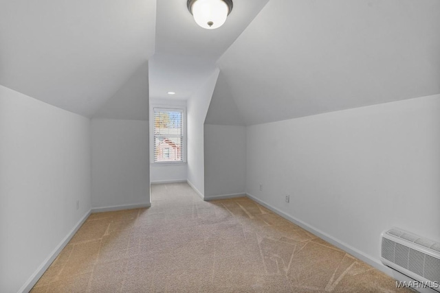 bonus room with carpet flooring, vaulted ceiling, and baseboards