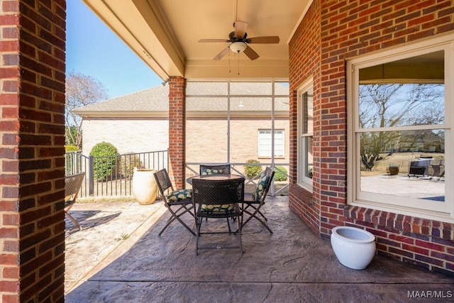 view of patio featuring a ceiling fan