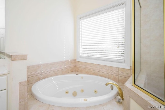 bathroom featuring a tub with jets