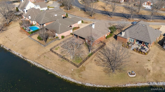 aerial view with a water view and a residential view