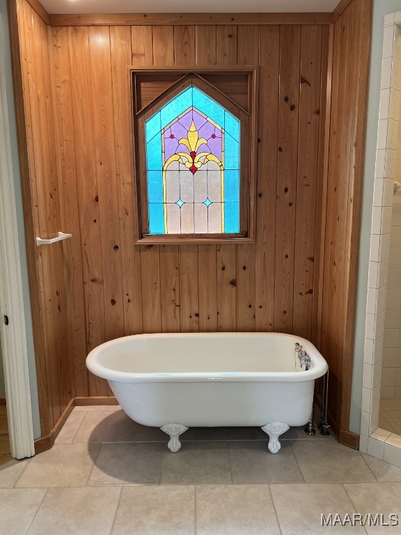 753 Bluff Rd, Rockford, AL 35136 - full bath with a soaking tub, tile patterned flooring, and wood walls
