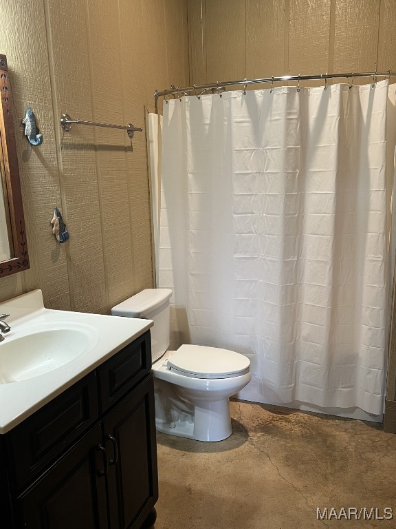 753 Bluff Rd, Rockford, AL 35136 - full bathroom with a shower with shower curtain, concrete floors, vanity, and toilet