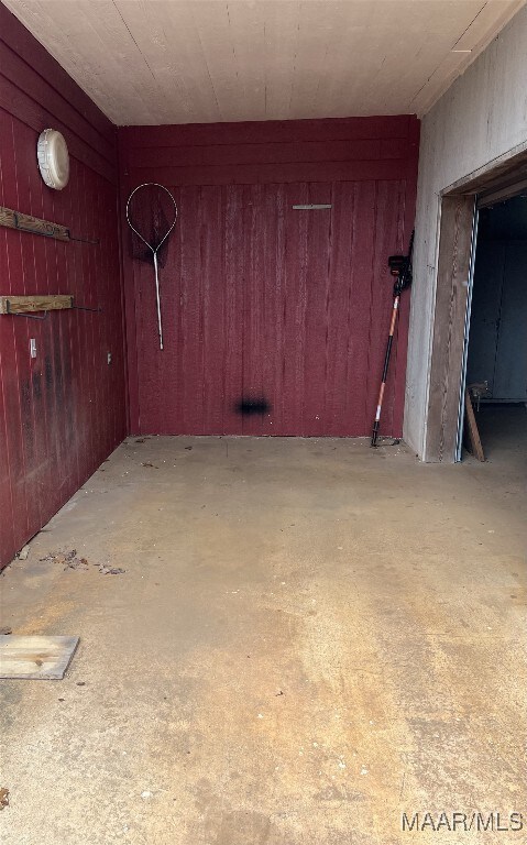 753 Bluff Rd, Rockford, AL 35136 - unfurnished room with wooden walls