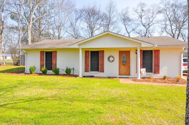 single story home with a front lawn and brick siding