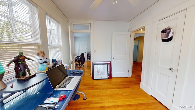 932 E Fairview Ave, Montgomery, AL 36106 - playroom featuring arched walkways, a ceiling fan, and light wood-style floors