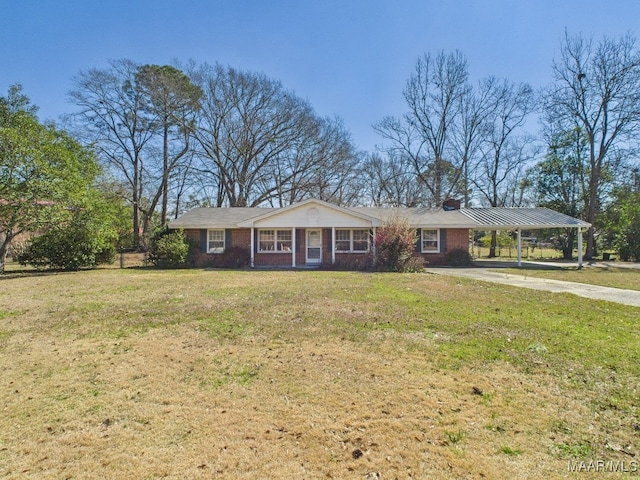 ranch-style house featuring driveway, a front yard, a carport, and brick siding