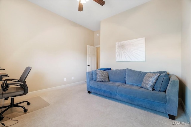 home office featuring carpet floors, vaulted ceiling, ceiling fan, and baseboards