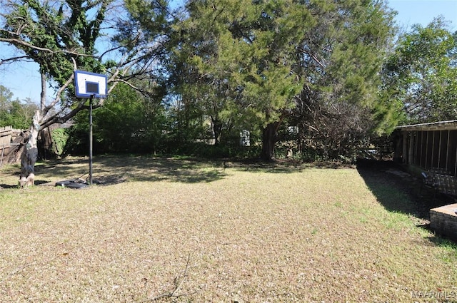 view of yard with fence