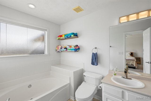 bathroom featuring visible vents, toilet, connected bathroom, vanity, and a bath