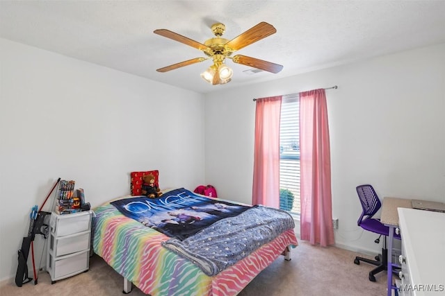 bedroom with carpet, visible vents, a ceiling fan, a textured ceiling, and baseboards