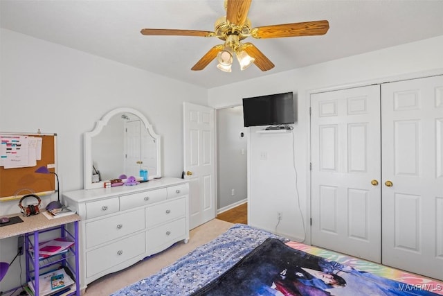 bedroom featuring a closet and ceiling fan