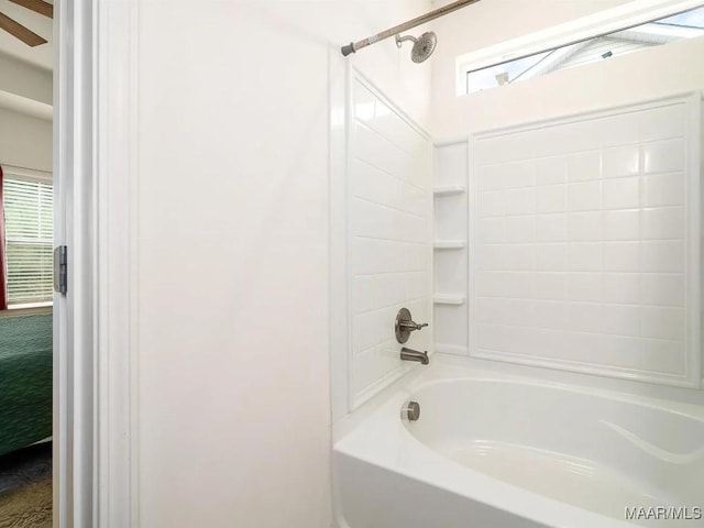 bathroom with shower / washtub combination