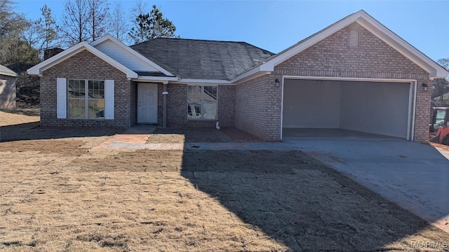 ranch-style house featuring a garage, driveway, and brick siding