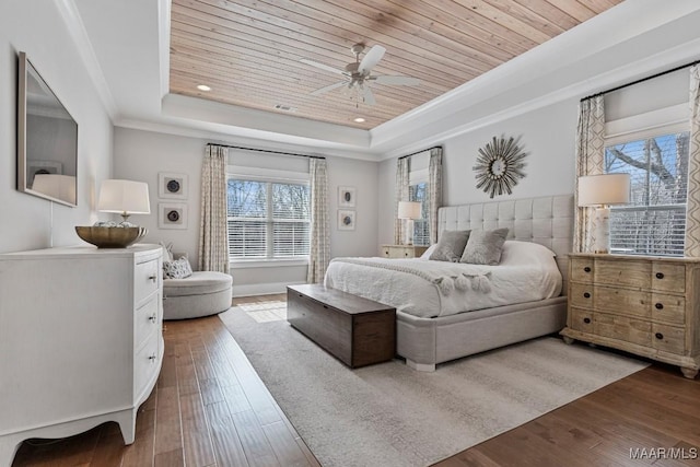 bedroom with a tray ceiling, crown molding, recessed lighting, wooden ceiling, and hardwood / wood-style flooring