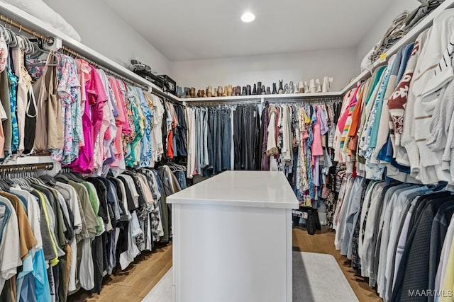 spacious closet with light wood-style floors