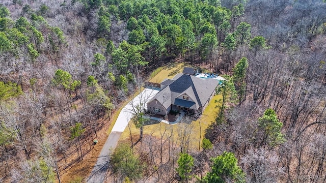 aerial view featuring a forest view