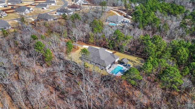 birds eye view of property with a residential view