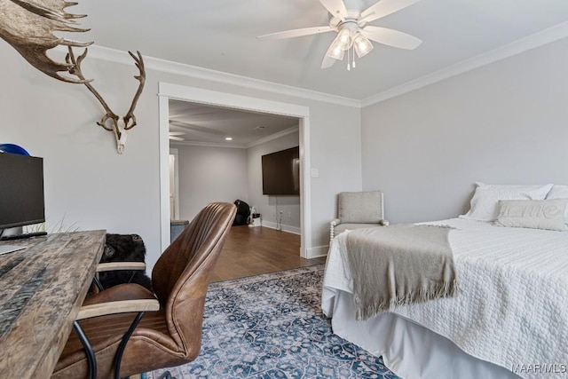 bedroom with ornamental molding, wood finished floors, a ceiling fan, and baseboards