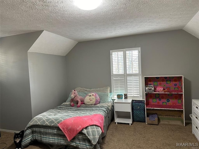 bedroom featuring a textured ceiling, baseboards, vaulted ceiling, and carpet floors