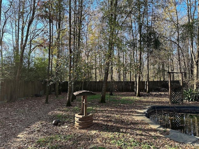 view of yard with fence