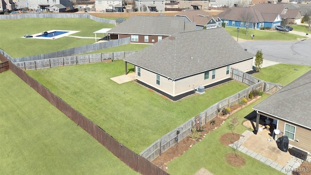 birds eye view of property with a residential view