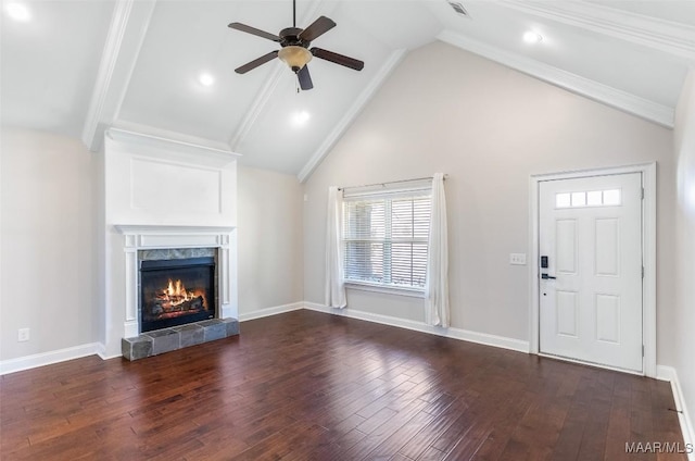 unfurnished living room featuring ceiling fan, wood finished floors, high vaulted ceiling, a tile fireplace, and baseboards