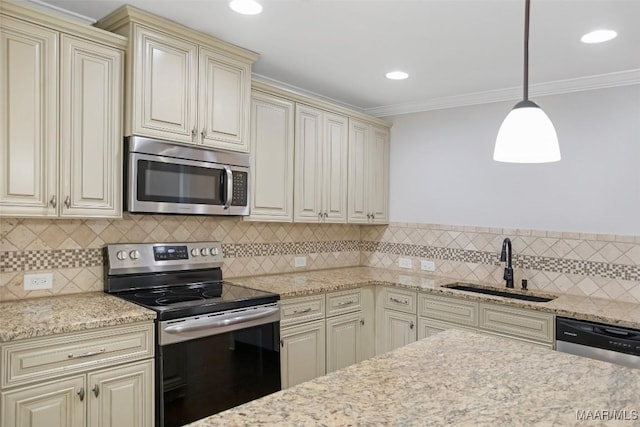 kitchen with stainless steel appliances, a sink, cream cabinetry, tasteful backsplash, and crown molding