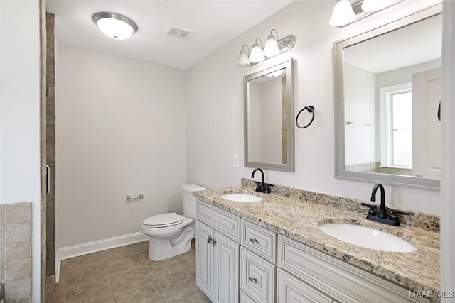 full bath featuring visible vents, a sink, toilet, and tile patterned floors