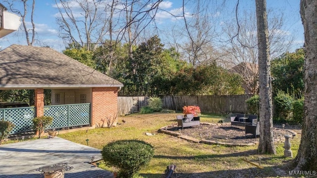 view of yard with a patio and a fenced backyard