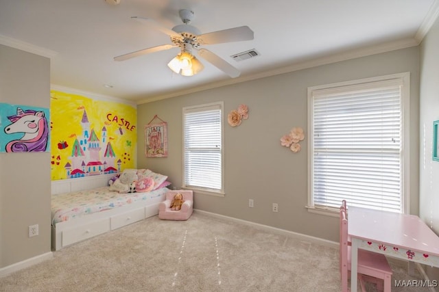 carpeted bedroom with baseboards, visible vents, ceiling fan, and crown molding