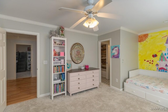 bedroom with light carpet, attic access, baseboards, a ceiling fan, and crown molding