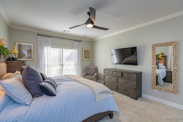 bedroom featuring light carpet, a ceiling fan, visible vents, baseboards, and ornamental molding