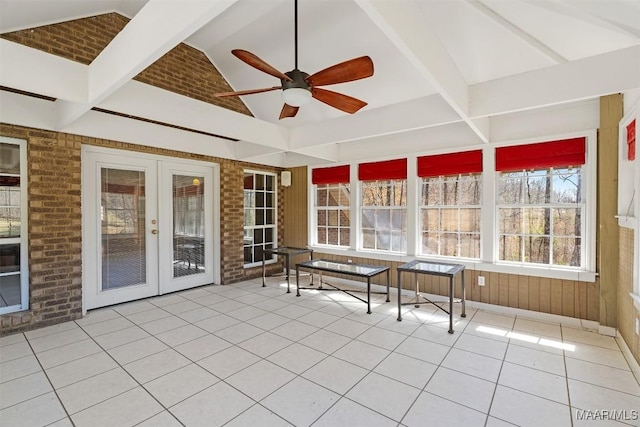 unfurnished sunroom with a ceiling fan, french doors, and lofted ceiling with beams