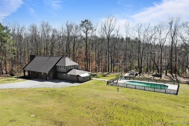 exterior space with a forest view