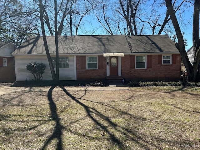 single story home with crawl space and brick siding