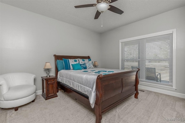 9524 County Road 42nd Rd, Jemison, AL 35085 - bedroom featuring light colored carpet, a textured ceiling, and baseboards