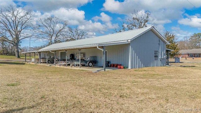 9524 County Road 42nd Rd, Jemison, AL 35085 - back of property with a carport, a yard, and metal roof